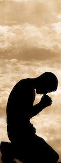 Person praying on knees